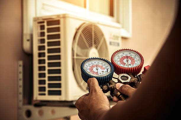 Professional Hvac technician working in Newton Center, MA